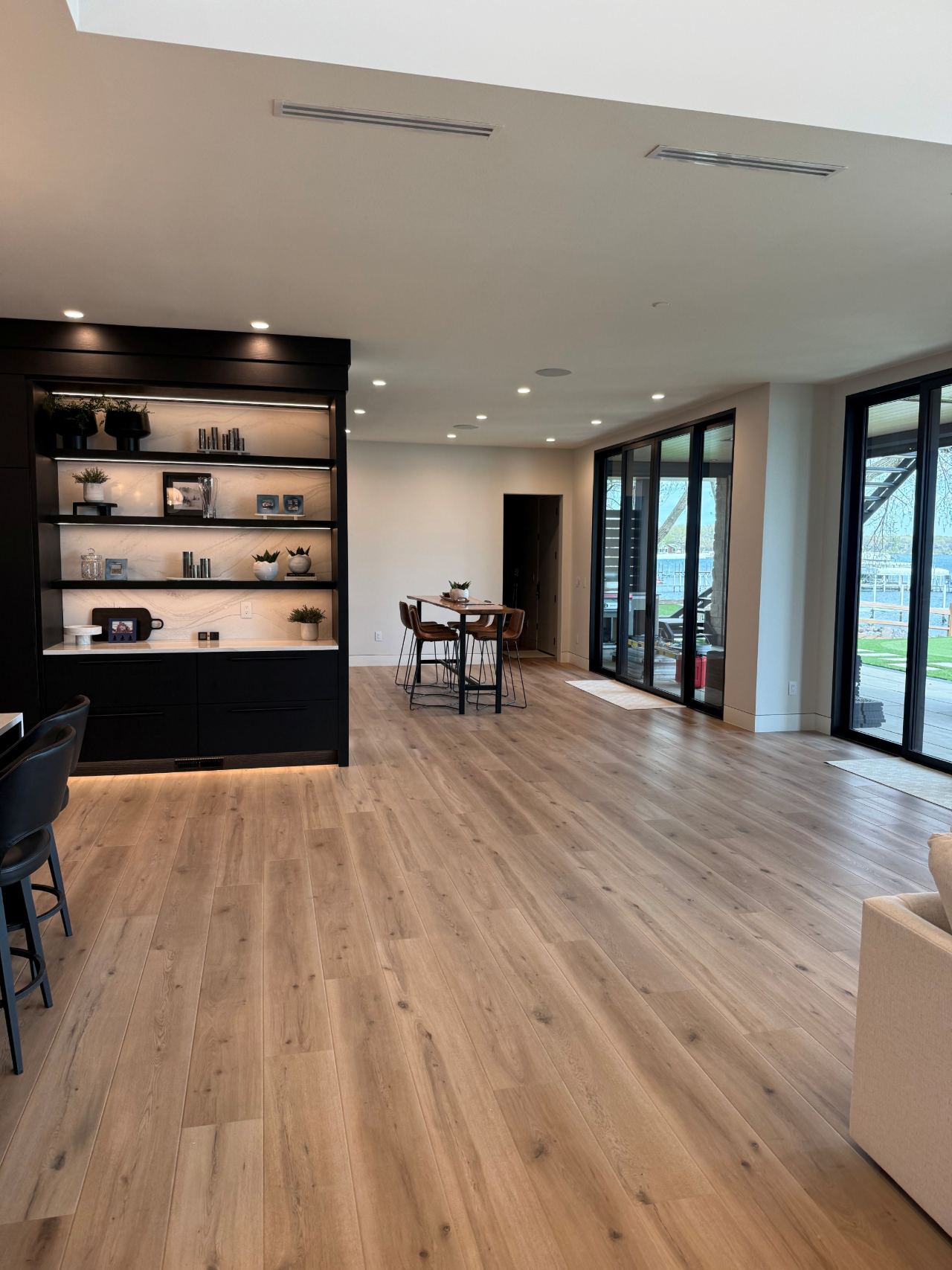 Open-concept residential interior with can lighting and clean electrical finishes installed by MG Electric